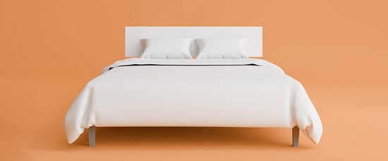 White bed on orange background